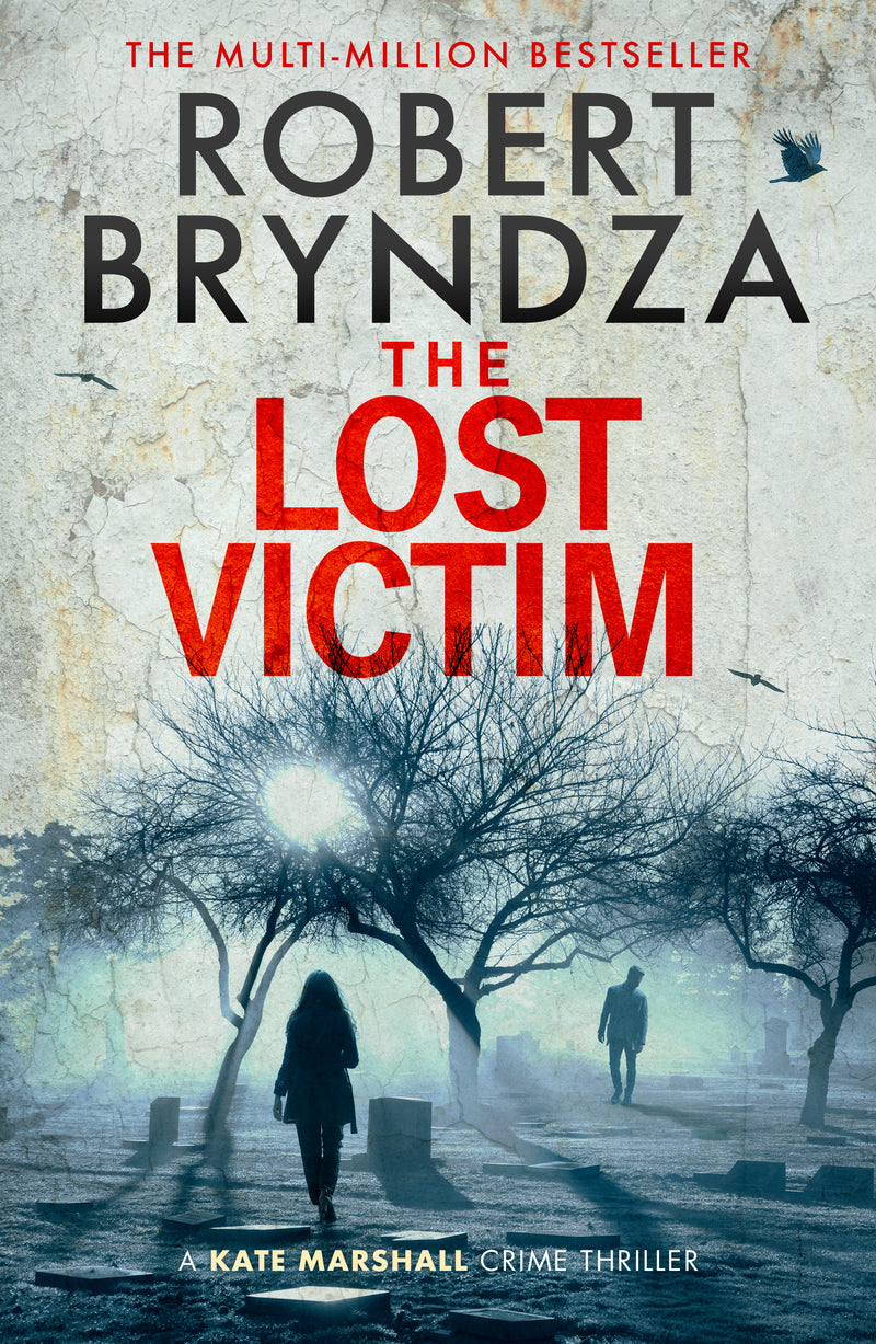 Book cover of 'The Lost Victim' by Robert Bryndza with a silhouette of a person walking through a misty cemetery.